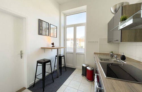 Schleswig Apartment | Old apartment with panoramic view of the Schlei, balcony and fireplace in the heart of Schleswig