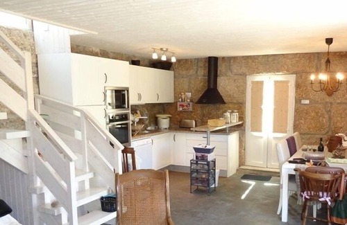 Amarante House | Old stone house with swimming pool and river.