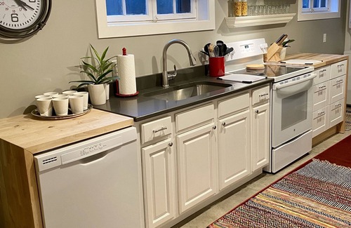 Cherry Creek House | Old World Charm Basement Level Flat in upscale Cherry Creek