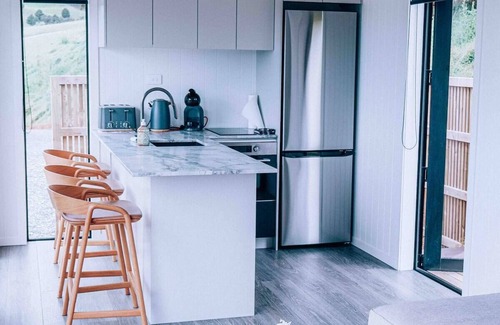 Tawharanui Cabin | Omakana Cottage, Omakana Cottage with Farm Views & Cedar Hot Tub