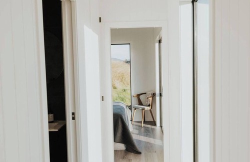 Tawharanui Cabin | Omakana Cottage, Omakana Cottage with Farm Views & Cedar Hot Tub