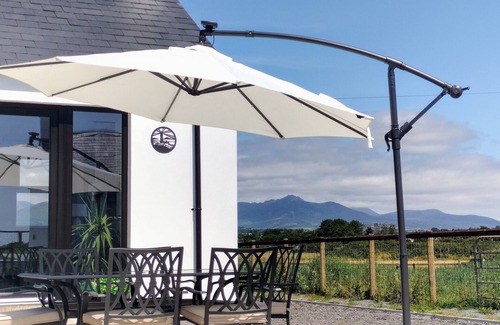 Newry House | On Cranfield beach modern house sea/mountain views