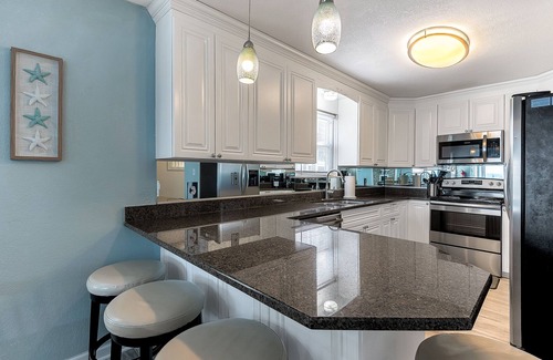 Chic's Beach Condo | ON THE BEACH! Stunning Beachfront Property!