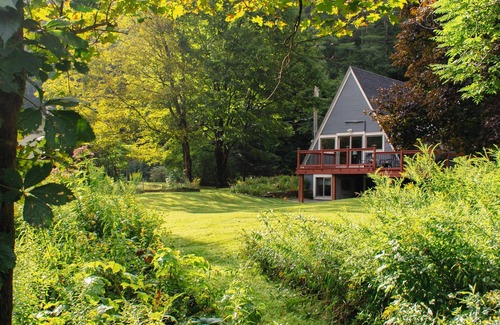 Waterbury House | On the River A-Frame. Cozy 4 season river, lake and ski retreat.