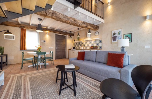 Cressa Apartment | One Bedroom Loft Style Apartment in Restored Farmhouse