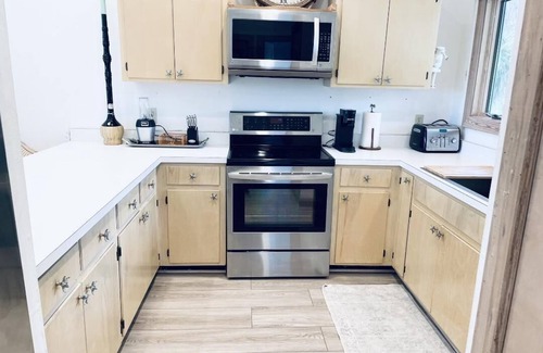 Treasure Beach Village House | ONLY 50 steps to the beach! FREE Beach cart, Chairs,bikes,kayak,paddle board