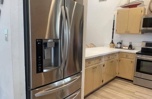 Treasure Beach Village House | ONLY 50 steps to the beach! FREE Beach cart, Chairs,bikes,kayak,paddle board