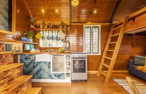 Dereham Cabin | Oozing character and hidden surprises, Dixie is a repurposed horse box set in a wonderful wild flowe