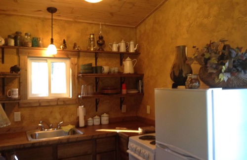 Custer Cabin | Original Log Cabin At Entrance To Custer State Park Overlooking Stockade Lake