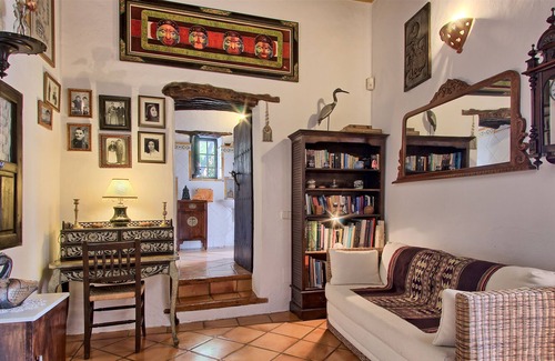 Sant Miquel de Balasant Villa | Original restored stone-wood ibizan country villa with pool facing sunset.