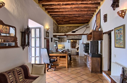 Sant Miquel de Balasant Villa | Original restored stone-wood ibizan country villa with pool facing sunset.