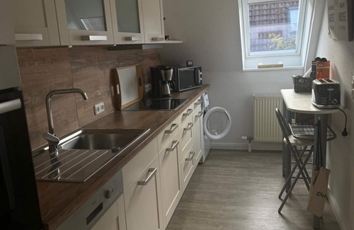 Wulfen Apartment | Ostseebrise-Fehmarn - time out by the sea, with a country-style fireplace, 400 m to the sea