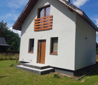 Szczytno House | Otulony słońcem - domek do wynajęcia Marksewo