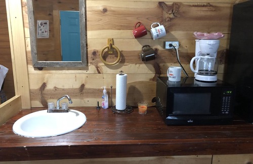 Mertzon Cabin | Our cabins are located on the crystal clear water of Spring Creek.