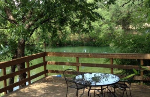 Mertzon Cabin | Our cabins are located on the crystal clear water of Spring Creek.