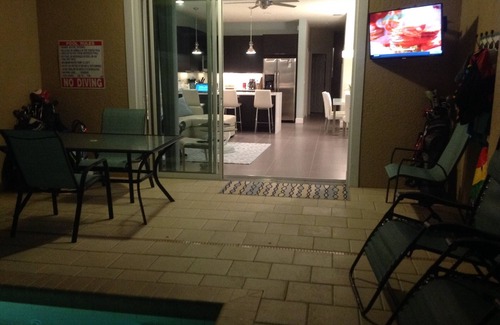 Four Corners House | Outstanding, owner operated Townhome, even a TV in the pool area!