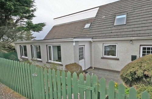 South Erradale Cottage | Overlooking the sweeping sandy bay of Opinan on the stunning west Highland coast .