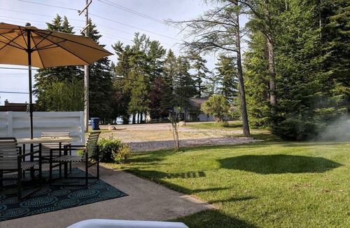 Rapid City Cottage | Overlooking Torch Lake sandbar