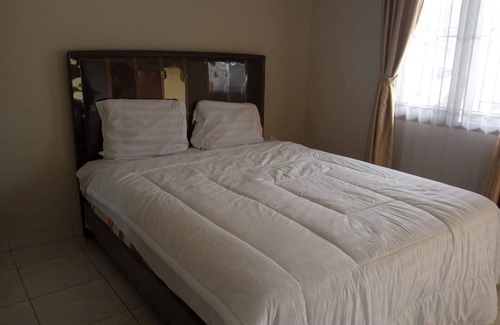 Pekanbaru Hotel | OYO 93850 Njy House SyariahNearBandara Sultan Syarif Kasim II