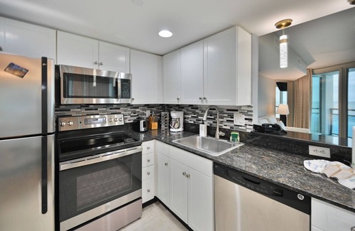 Downtown Myrtle Beach Condo | Panoramic Oceanfront Condo, Highly Sought After End Unit, Glass Wrapped Around