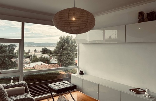 Sandy Bay Apartment | Panoramic water views, sunny and private - walk to beach, cafes and shops