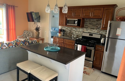 Dickenson Bay Condo | Paradise beach front condo with stunning views. (Flexible cancellations)