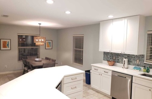 Butler Beach House | Paradise by the River - Relax in Style! New Pool and Heated Spa!