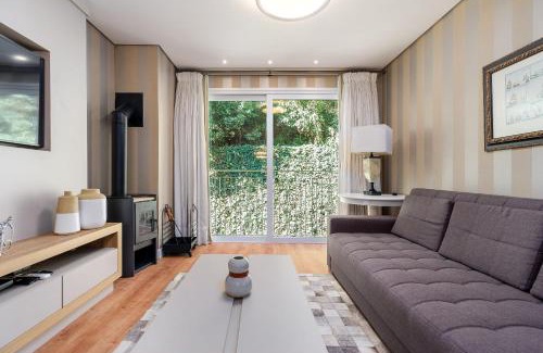 Vila Suica Apartment | Parque das Orquídeas 2 dorm by Achei Gramado