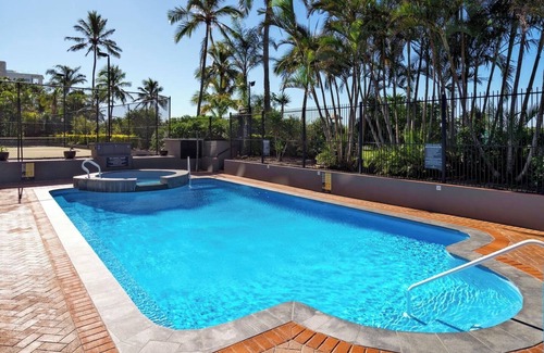 Palm Beach Apartment | Pastel Drift Beachfront Haven by Dining and Parks