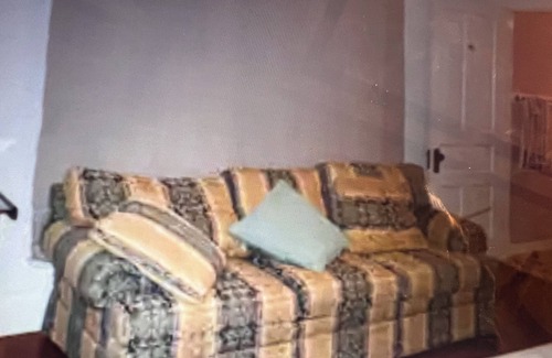 Anniston Apartment | Peace Apartment, upstairs with king size bed.