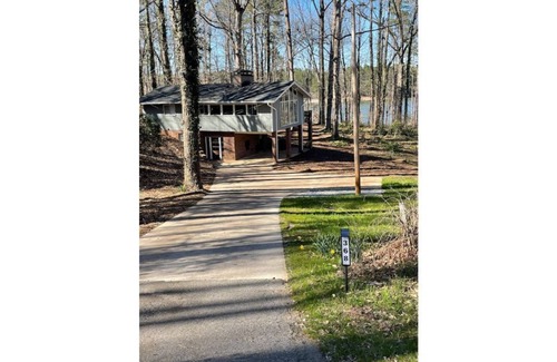 Dawsonville House | Peaceful 3 bedroom lakehouse w/private wooded lot.