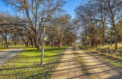 Fredericksburg Cabin | Peaceful, family-friendly cabin w/ playground, firepit, & shared hot tub!