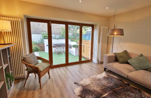 Bow West Apartment | Peaceful Garden Apartment on Roman Road