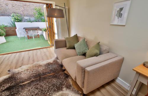 Bow West Apartment | Peaceful Garden Apartment on Roman Road