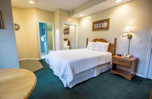 Branson Hotel | Peaceful Spot with Fireplace and Balcony Views of Scenic Ozark Hills