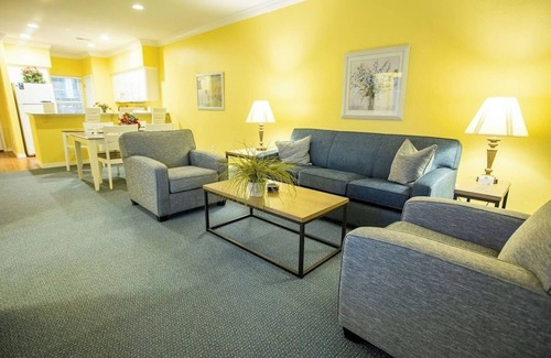 Branson Hotel | Peaceful Spot with Fireplace and Balcony Views of Scenic Ozark Hills