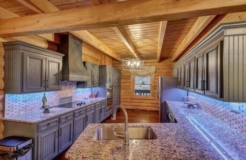 Gainesville Cabin | Peaceful, Waterfront Luxury Cabin w/party dock & hot tub near new Olympic Park