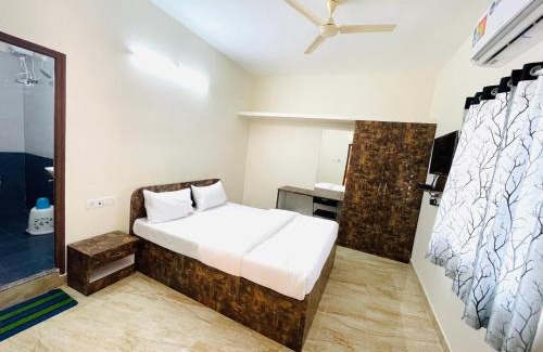 Tirupati Hotel | Pearl Stays, Tirupati - Very convenient for the people coming from Bangalore and Chennai - You can skip city traffic while reaching any temple in Tirupati - Covered Parking - 24hrs Front Desk and Hot Water - Free WiFi - Flexible Checkin-in Check-out times