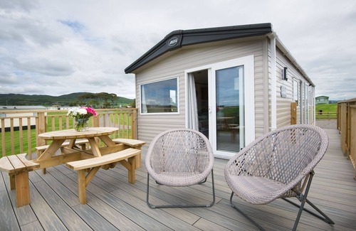 Castle Douglas Cottage | Pebbles - a static caravan that sleeps 6 guests in 3 bedrooms