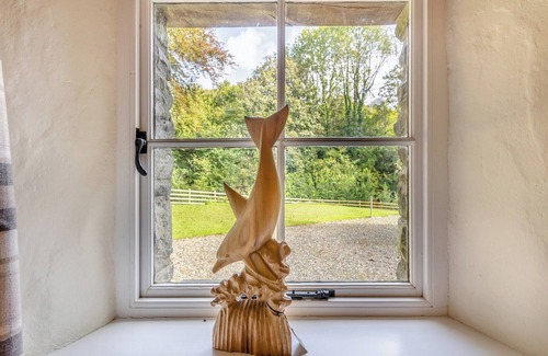 Bontnewydd Cottage | Penpompren is a beautiful thatched cottage located in the Cambrian Mountains.