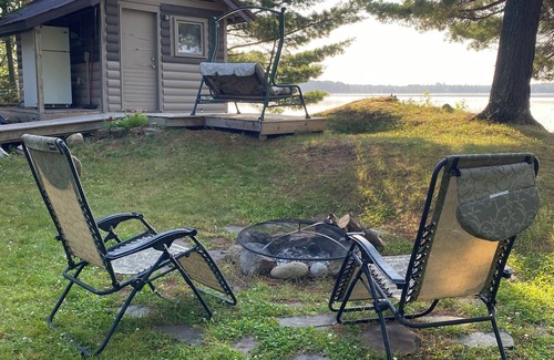 Britt House | Perfect spot for your next stay: RV camper on quiet, wooded lake lot