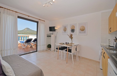 Cala Agulla Apartment | Perleta - Apartment with sea views and communal pool in Mallorca