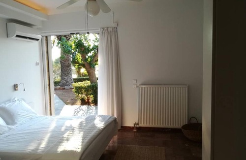 Chalcis Villa | Pine tree beachfront villa