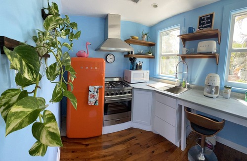 El Cid Cottage | Plant lovers' paradise cottage in Grandview Heights - walk to downtown WPB!