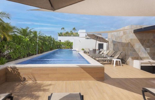 Jimenez Apartment | Playa del Carmen Apt: Pool, Backyard & Garage