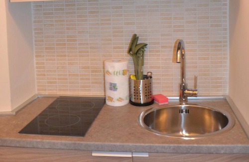 San Donato Apartment | Pomegranate | Short-term rental apartment for temporary use