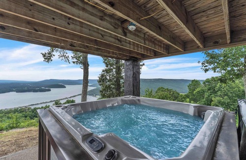 Bryant Cabin | Pop & Granny's cabin with a fire pit, hot tub, & indoor pool!
