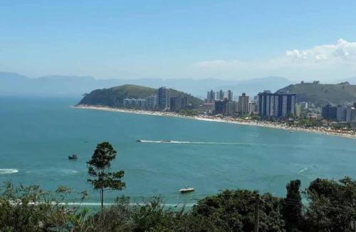 Caraguatatuba House | Por de sol no mar da cama