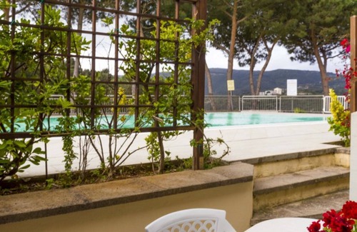Porto Azzurro Apartment | Porto 3 studio apartment near the center of Porto Azzurro with swimming pool