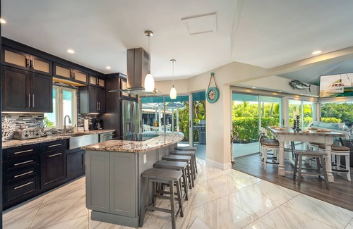 New Town House | Poseidon's Paradise: Luxury Waterfront Rental in Key West, Stunning Backyard Oasis and Private Pool!